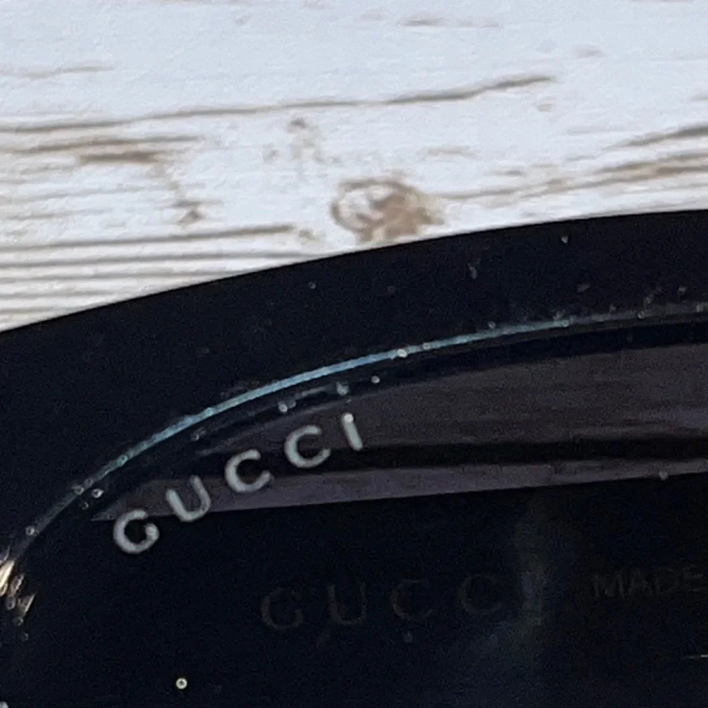 Gucci GG0057SK Classic Black Sunglasses good condition